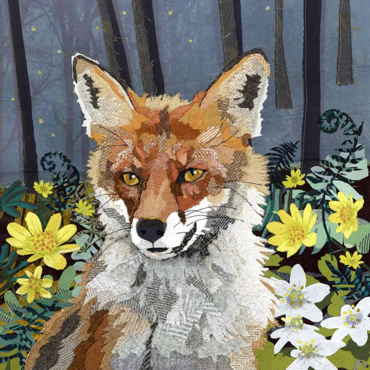 Embroidery art of a fox surrounded by flowers, showcasing textile craftsmanship.