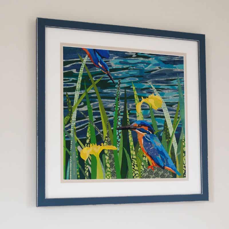 Vibrant kingfisher bird artwork in lush green wetland setting, framed wall decor.